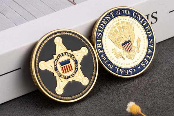 United States Secret Service challenge coin displayed in an office.