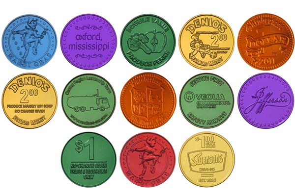 Colorful Mardi Gras tokens with various designs