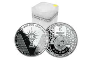 Qatar 2022 FIFA World Cup silver coins featuring intricate designs and the trophy