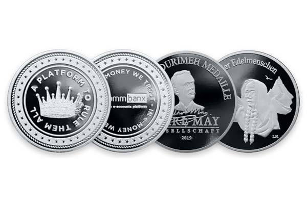 Custom silver coins with engraved designs