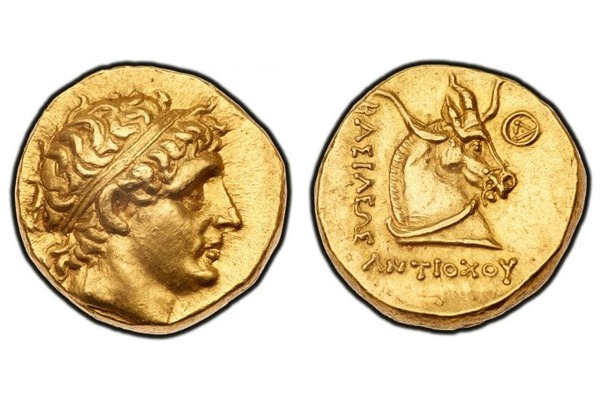 Ancient gold coin with a king's portrait and a bull